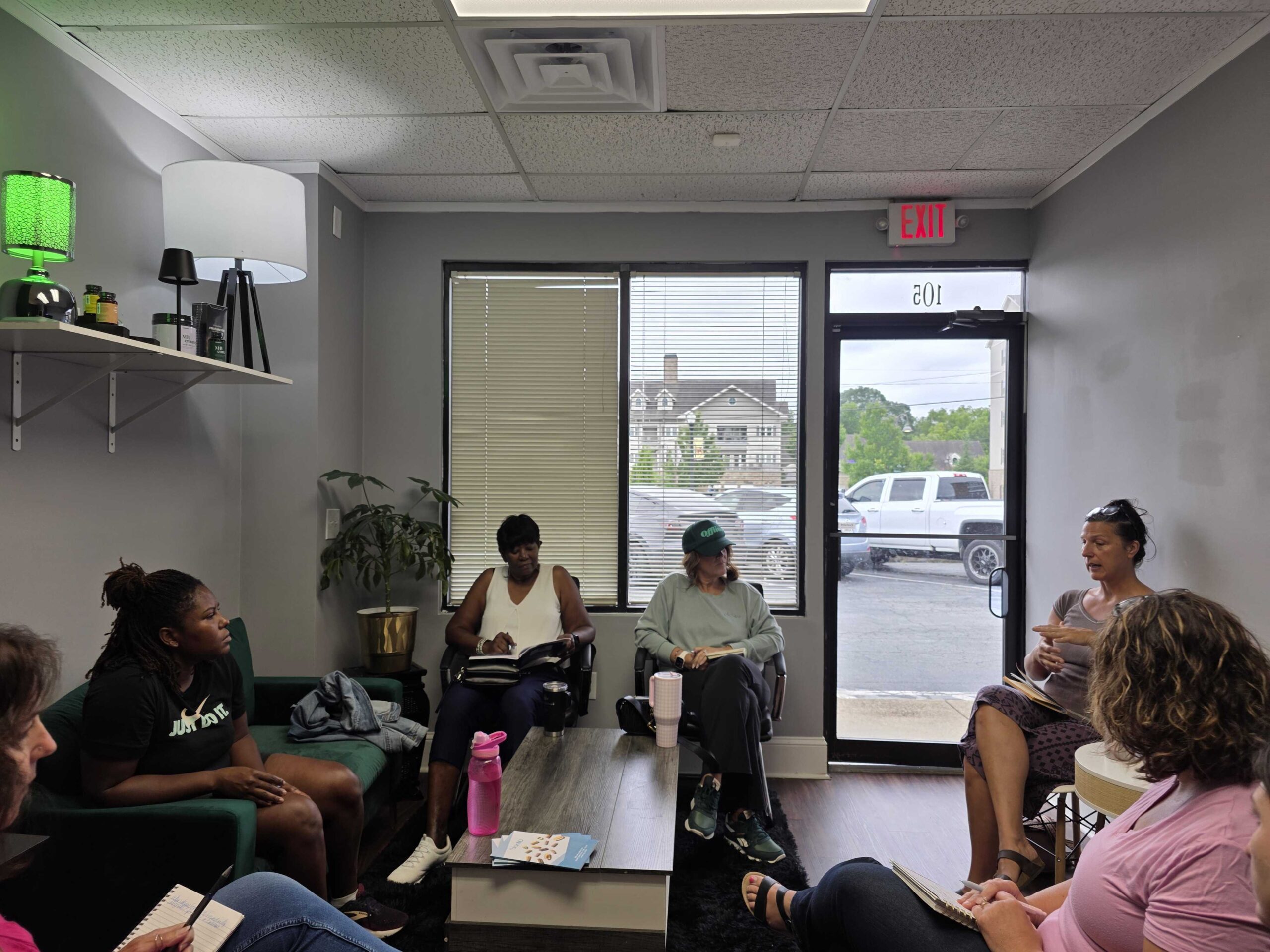 “A group of women talking together, representing community, collaboration, and empowerment at Women’s Business Connections”