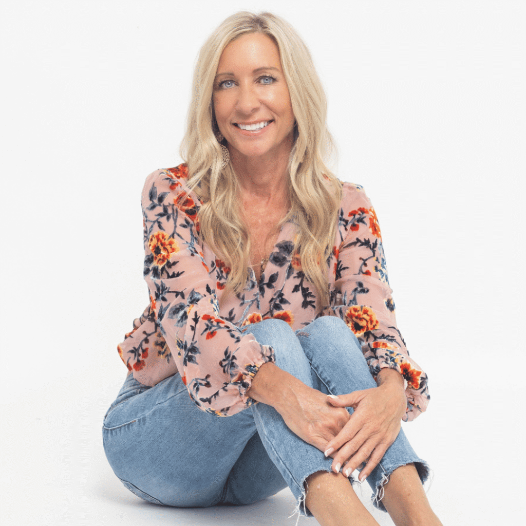 “Smiling woman sitting casually, representing confidence, authenticity, and women’s empowerment at Women’s Business Connections”